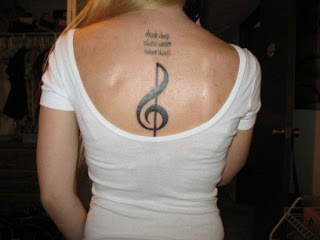Tattooed Women - Musical Notes Back Tattoo Designs