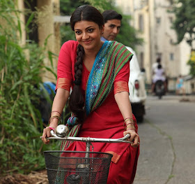 Actress Kajal Agarwal latest stills in Akshay Kumars Special 26 movie, Kajal Agarwal latest cycle riding images