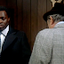 YAPHET KOTTO TRUCKS ACROSS 110TH STREET