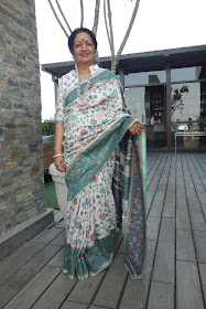 White and green kani saree