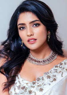 eesha wearing white saree with beautiful neck less