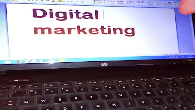 Digital marketing projected out of a computer screen.