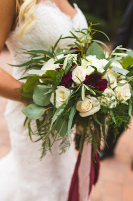 white and maroon bridal bouquet