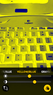 Magnifier captured an image of a keyboard and user applied yellow/blue high contrast mode