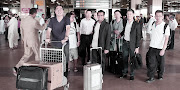 The group at the entrance of the Karachi Airport. (dscf )