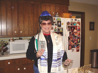 Laurel with items of Jewish worship and prayer