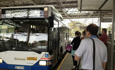 A half-hourly Sydney bus departs too full to take on passengers at the Edgecliff rail interchange