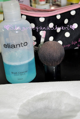 image of elianto brush cleanser and MAC 182 kabuki brush