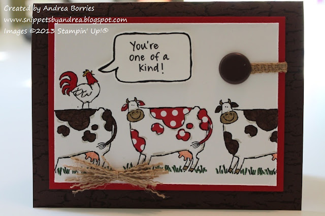 Card with three cows (two with bown spots and one with red/white polka dots) and a rooster "saying" the sentiment "You're one of a kind."