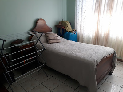 large bedroom with built-in-cupboards