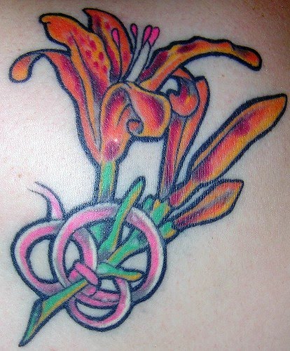 flower tattoo designs and meanings. Lily flower tattoo designs can