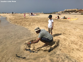 Family playing on beach