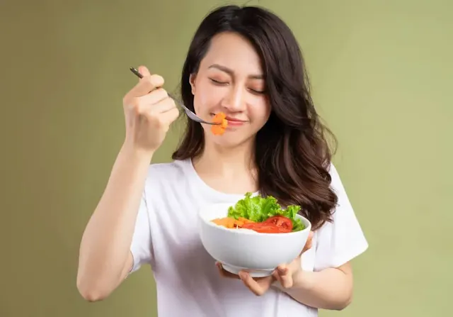 Asian girl eating Healthy Summer Dinner