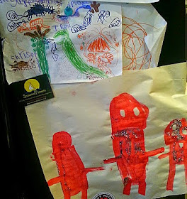 What would you save in a fire? Children's artwork on fridge