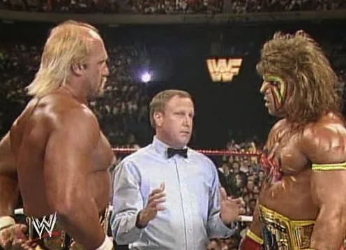 WWF / WWE - Wrestlemania 6: The Ultimate Warrior and Hulk Hogan stare down before making history in a classic main event