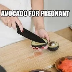 avocado for pregnant.Close-Up Shot of apregnant Slicing an Avocado