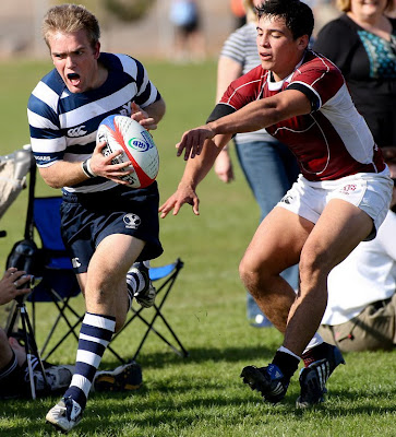 BYU Rugby Scrumhalf Shaun Davies lets out the war cry as he slips past the Texas A&M defense