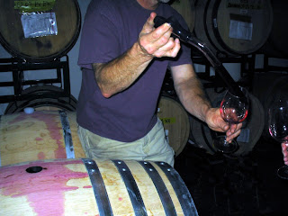 This style of barrel is called a barrique.  It holds enough wine to make about 25 cases of wine. (c)2008 SmellsLikeGrape.