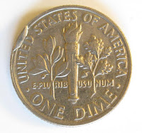 Dime with a cud, cud coin reverse