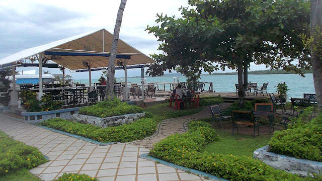 the restaurant and garden overlooking the sea and Tubabao Island at Tanghay View Lodge in Guiuan Eastern Samar