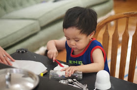 child playing with homemade playdough