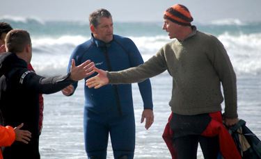 Whales beach in Kommetjie, Cape Town, South Africa.  Arguing with an official.
