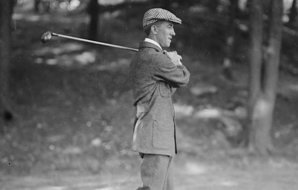 Golfer Fred McLeod swings in the early 1900s