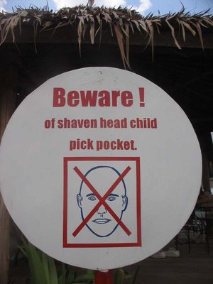 funny warning sign - beware of pick pocket