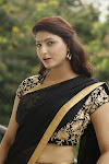 Sagarika glamorous photos in saree-thumbnail-18