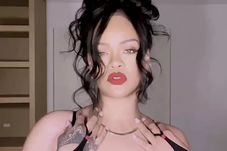 Rihanna Pairs a Corset Dress from Her Lingerie Line with Thigh-High Boots in Steamy Video