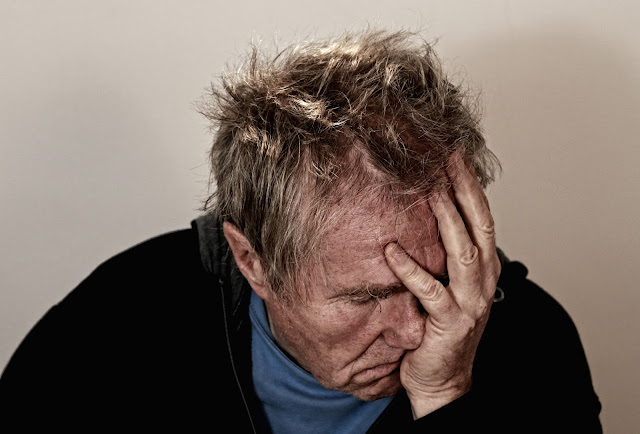 depressed man looking really bad