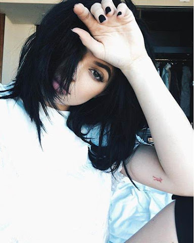 Kylie Jenner Grimaces As She Goes Back Under The Needle!