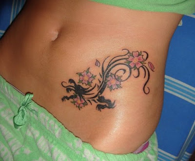 Girls Tattoos-Tribal Dragon Tattoo With The Flower