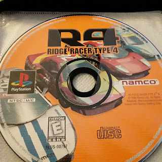 R4 Ridge Racer Type 4 game disc for the PlayStation