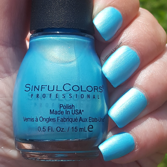 Sky blue neon nail polish with opalescent shimmer