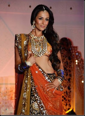 Malaika Arora walks the ramp for Shagun Vikram Phadnis