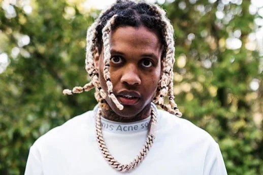 Lil Durk performing on stage in Chicago.