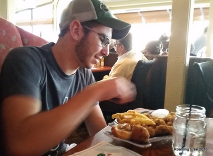 Bryce eating gator bites