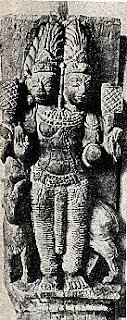 The two headed Agni, the fire-god, riding a ram; South Indian temple carving.