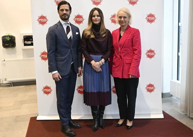 Princess Sofia wore a stretch crepe with colourblock a-line skirt by Hugo Boss, and brown silk satin blouse by Hugo Boss