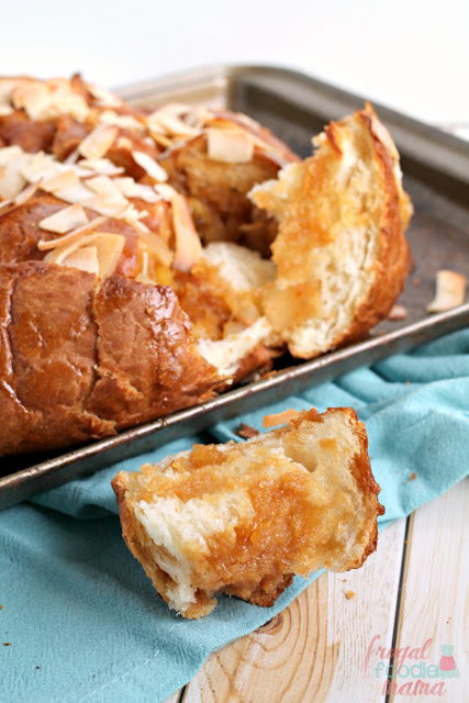 If you are looking for a sweet tropical treat that will feed a crowd, you can't wrong with this easy to make Pina Colada Pull-Apart Bread.