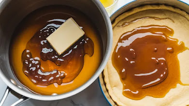 "Melted golden syrup, butter, and brown sugar mixture being stirred for the Cornflake Tart filling."
