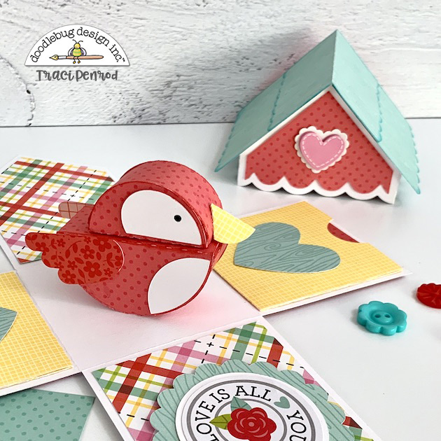 Birdhouse Explosion Box with pockets and a cute red 3D bird inside