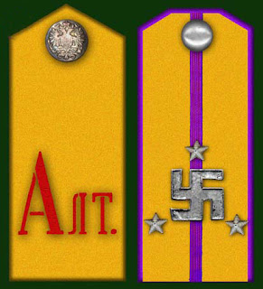 Military shoulder insignias. Yellow with red writing (left) and yellow with silver swastika (right).