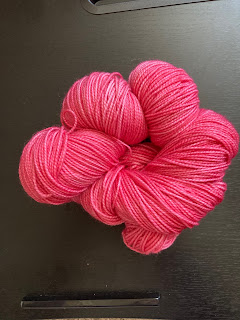 a skein of very bright hot pink yarh