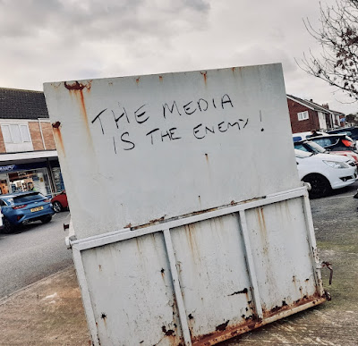 The Media is the Enemy on a bottle bank