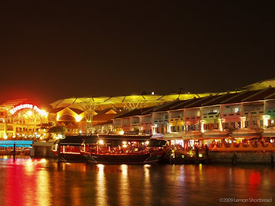 Clarke Quay lies along the Singapore River At night the pubs and chillout