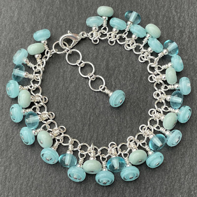 Icy blue handmade lampwork glass bead bracelet by Laura Sparling