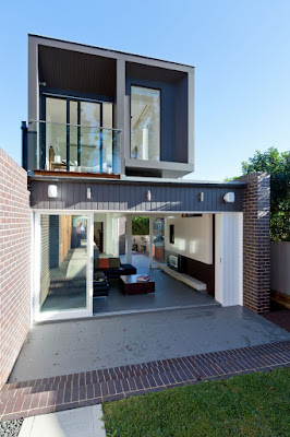 Interesting G House Exterior Design with Concrete Floor, Grey Wall, Wide Glass Door and Brick Wall