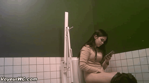 A hidden camera in a toilet in a public shopping center caught pissing girls (Toilet Green Wall)